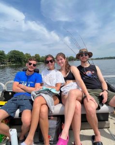 Guests enjoying a sunny day on Rice Lake in their boat rental.